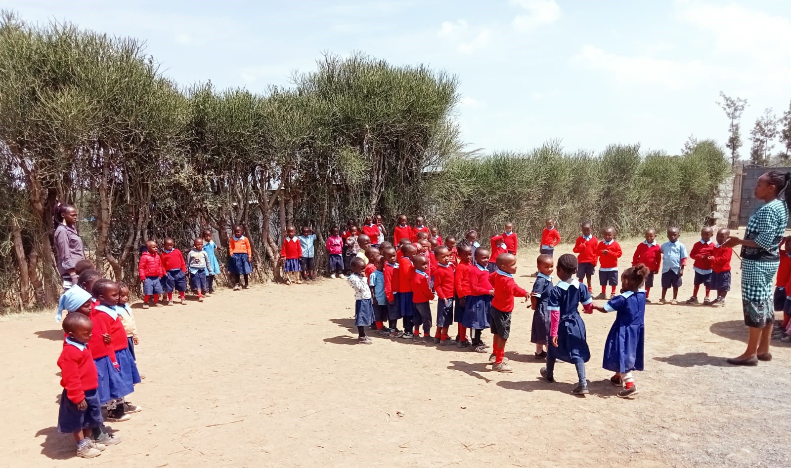 Students outside at a Shalom Preparatory school